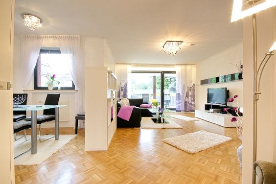 Helle, modern und ansprechend gestaltete Wohnung mit Terrasse in ruhigem Wohnumfeld Nähe U 11