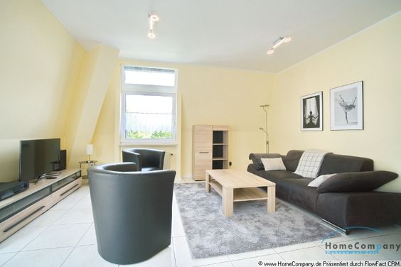 Apartment split over two levels, with balcony and parking space, in quiet, sought-after residential area.